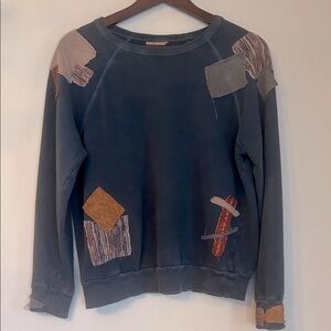 Upcycled patched cotton terry sweatshirt